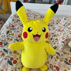 Yellow Pikachu Plush and Electric toy